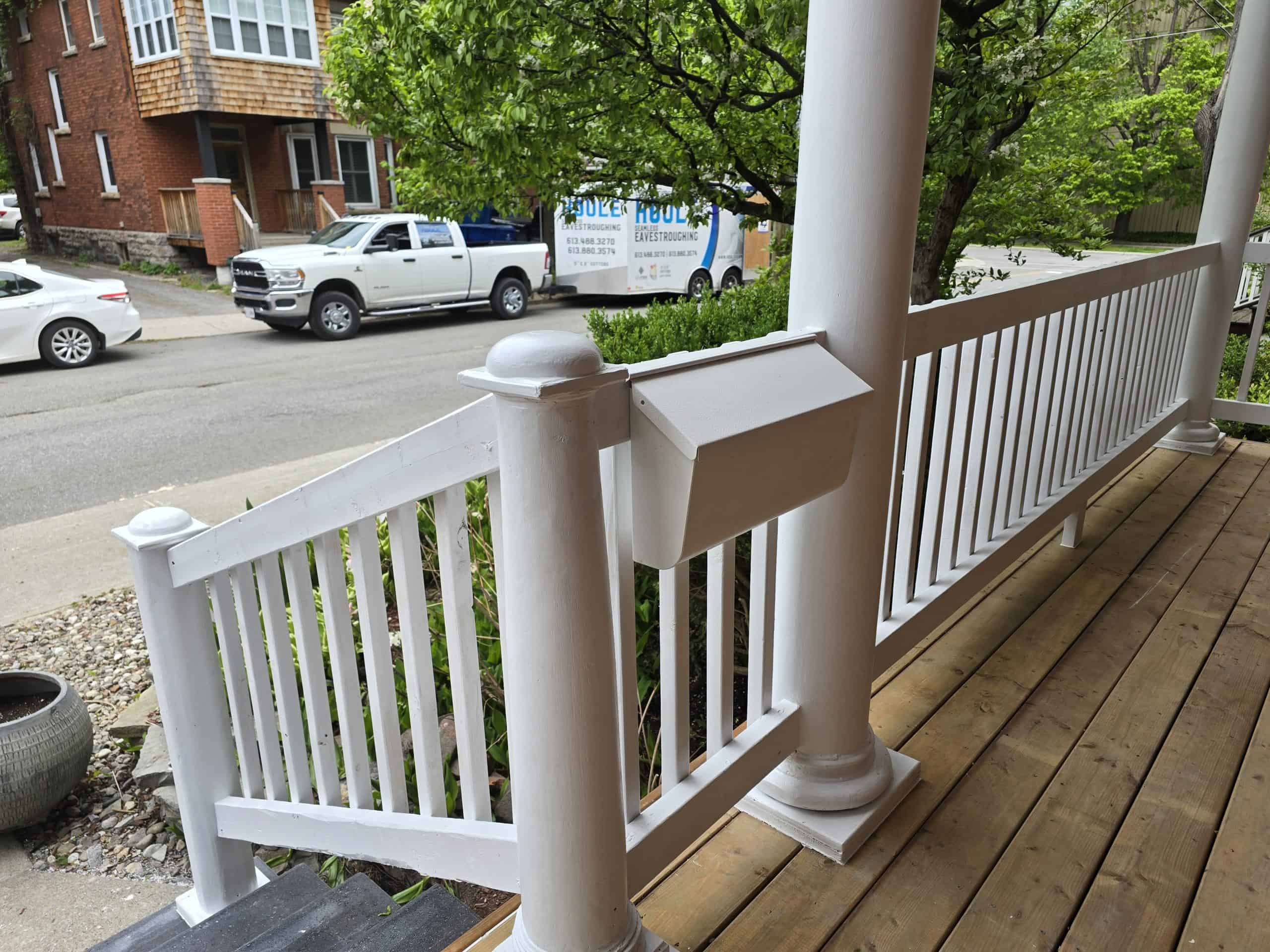 Beautiful white exterior railing built by MCD Contracting, showcasing expert craftsmanship, safety, and style for any home renovation project.